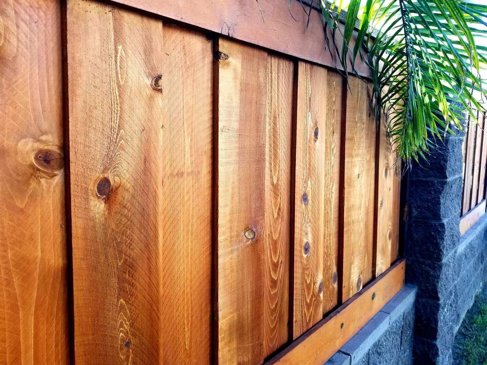 Warm stained wood fence detail from a Chula Vista Fence project