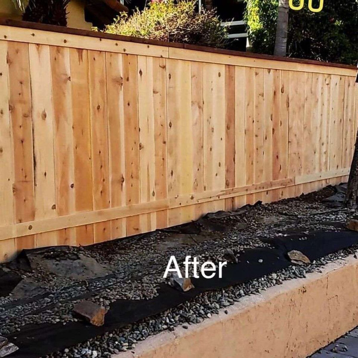 New cedar board fence with cap rail installed by Chula Vista Fence in Chula Vista, CA